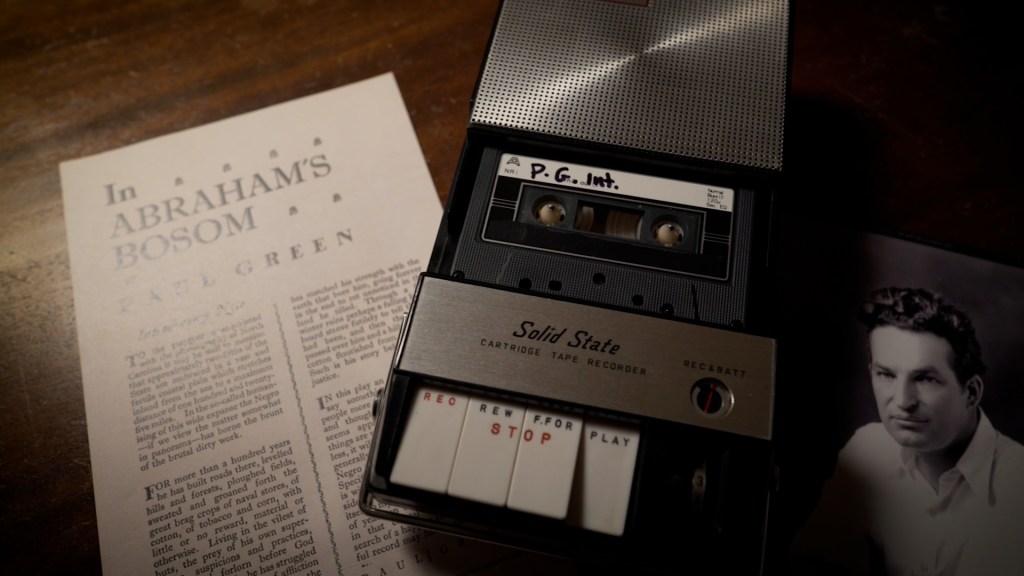 Vintage tape player and photo of Paul Green